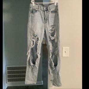 Distressed denim jeans